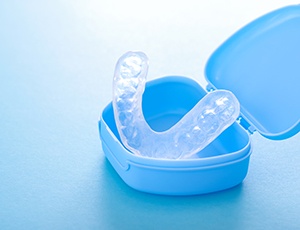 Oral appliance for bruxism in its storage case